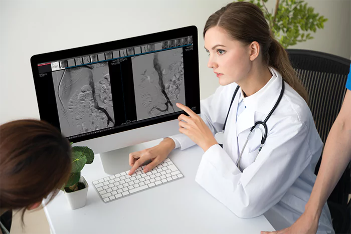 The doctor explained the vascular invasive exam